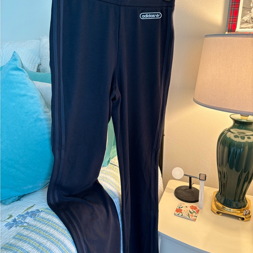 Sharp Adidas 3 stripe pants. Great for around town or to the gym! M/14